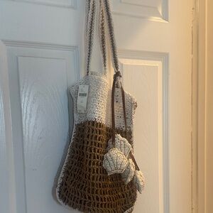 Brown and Cream Crochet Tote Bag from Anthropologie .